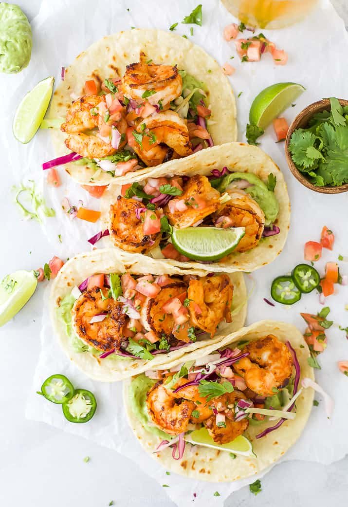 Spicy shrimp tacos with cilantro lime slaw and avocado crema